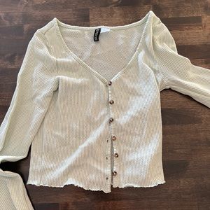 Divided long sleeve button up top